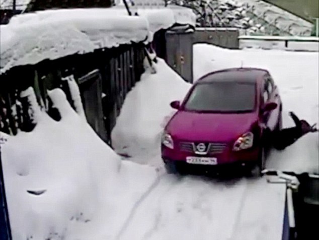 VID: Graphic Content: Russian Woman Run over Repeatedly by Neighbour after Scratching Car